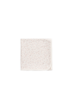 Couverture croisée intemporelle en coton biologique crème à motif floral, avec tissage respirant pour nouveau-nés